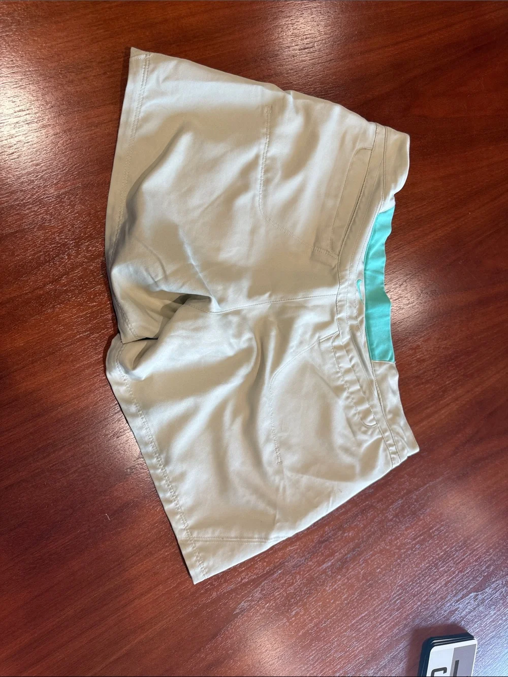 Nike Women's Light Khaki Performance Shorts with Teal Waistband